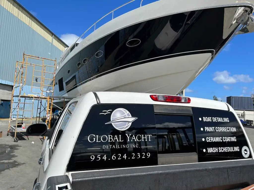 Global Yacht Detailing crew working on a yacht exterior