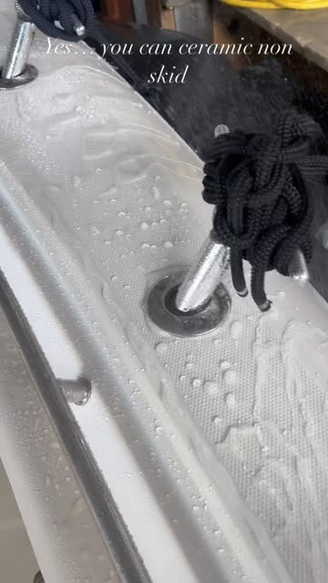 Ceramic coating beading water on a yacht non-skid deck