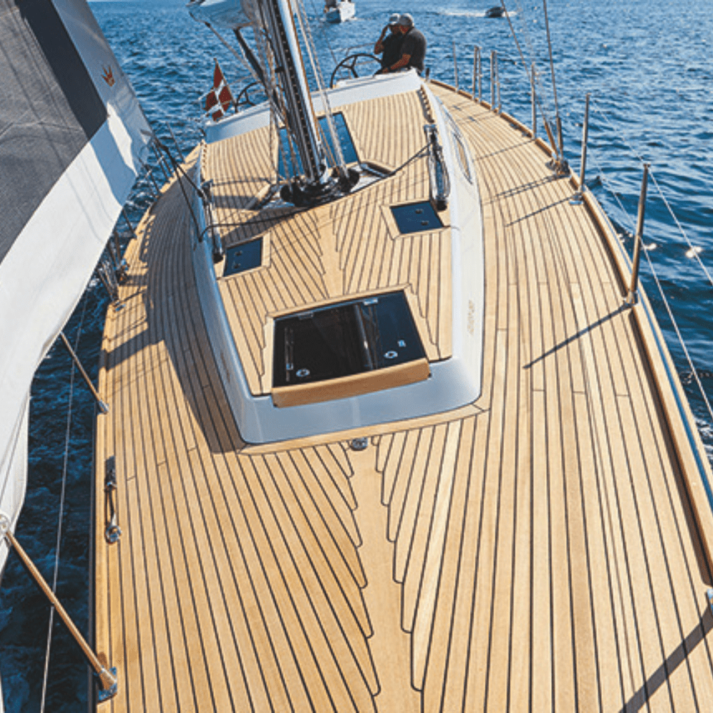 Freshly sanded and sealed teak deck on a yacht